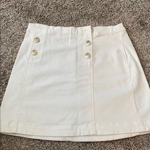White mini skirt with buttons